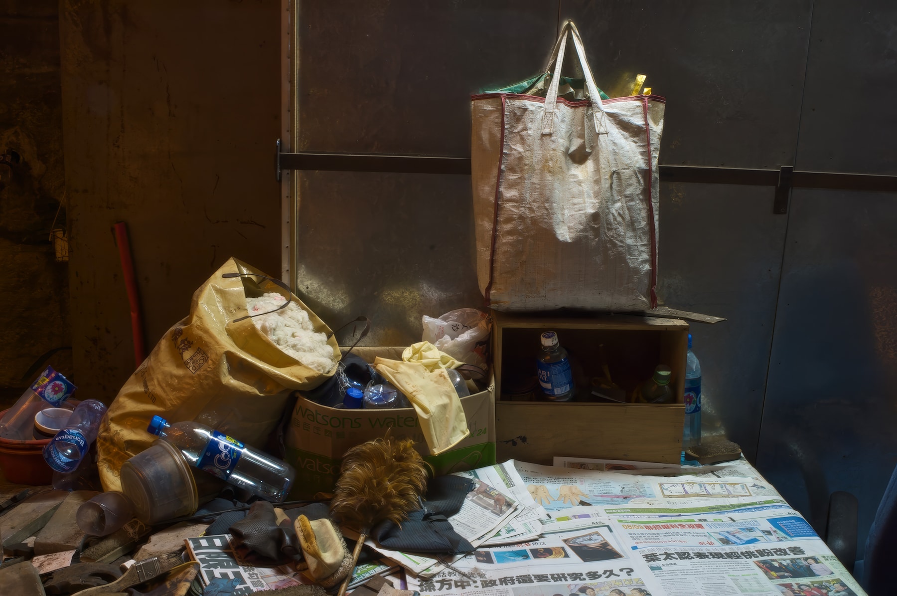 Watsons bags, newspapers and debris in dim interior, Hong Kong